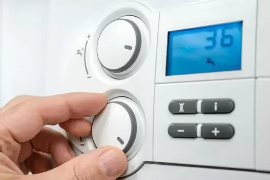 Boiler controls being adjusted