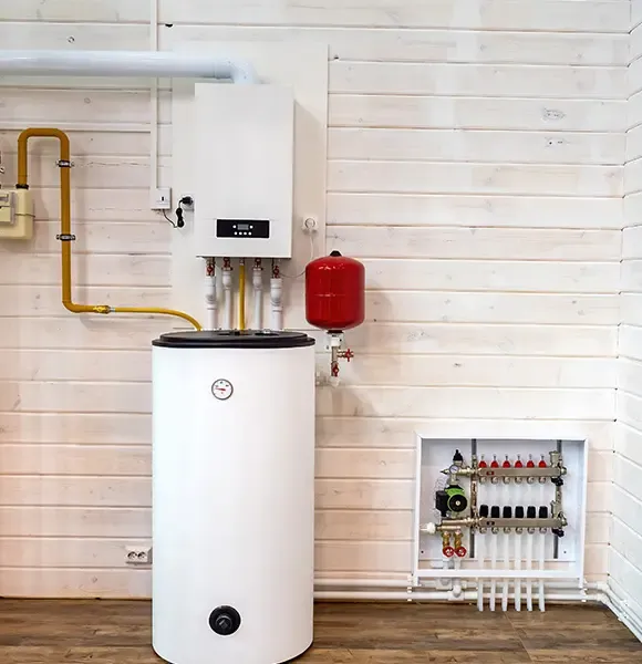 Gas heating installation with boiler and cylinder